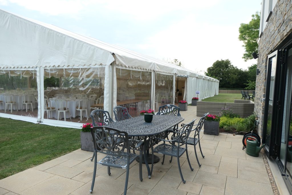 marquee by a house