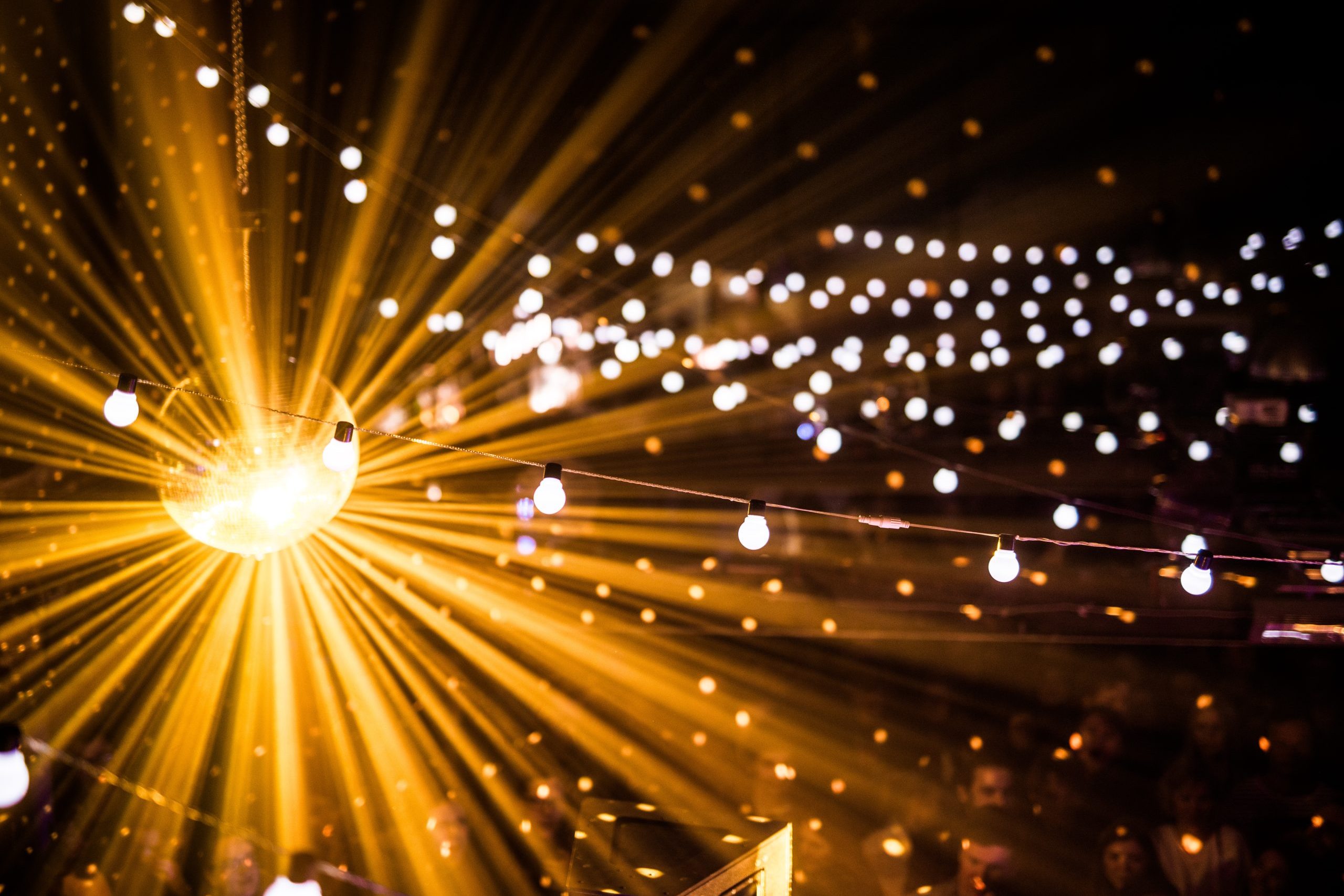 Low Angle View Of Illuminated Disco Ball At Nightclub